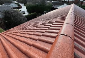 The roof of a Scottish home after home owners get roof tile refurbishment work done after discovering cracked tiles.