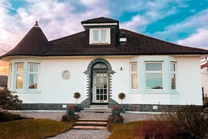 Exterior Wall Coatings protecting the rendered exterior of a Scottish home from weather exposure.